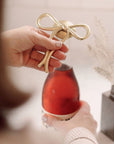 Brass Bow Bottle Opener