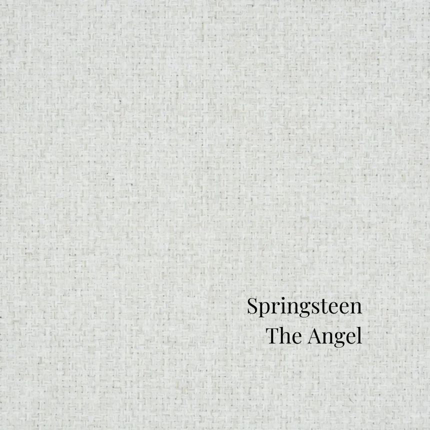 Text 'Springsteen The Angel' on a textured gray background in St. Albert