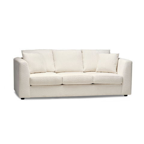 Cream sofa on a white background outside Edmonton