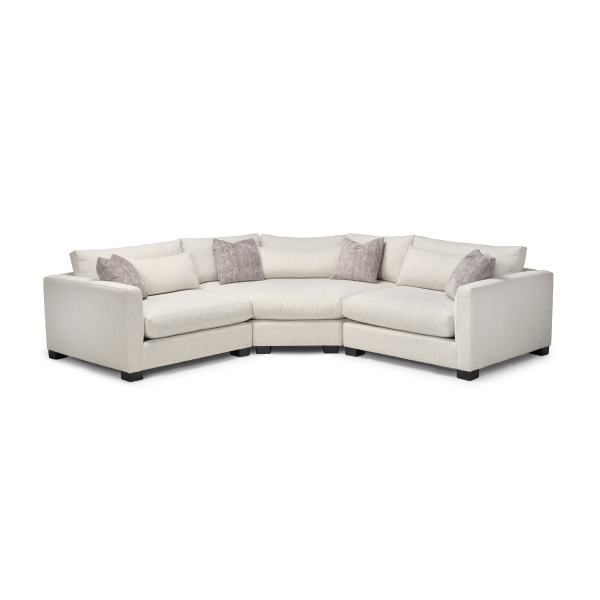 White sectional sofa with gray accent cushions on a white background in St. Albert