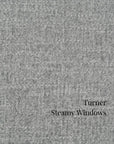 Textured gray fabric with 'Turner Steamy Windows' text in St. Albert